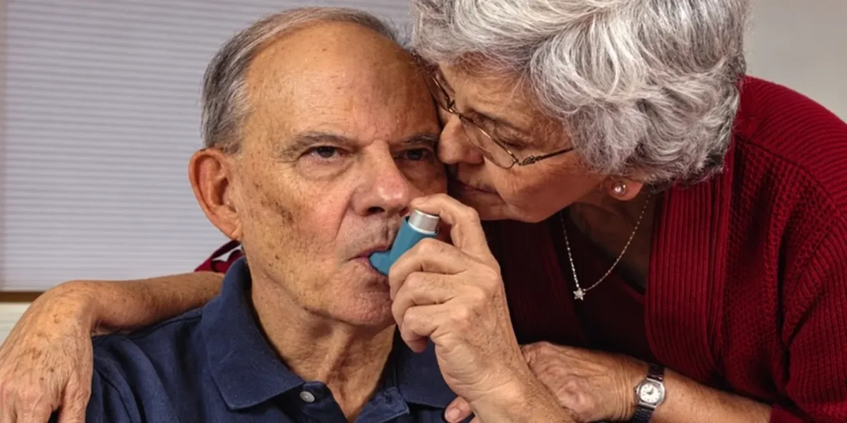 Older adult with a family member, building a calm daily breathing routine